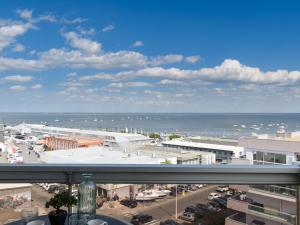 a view of the ocean from the balcony of a building at Studio Port Arcachon-6 by Interhome in Arcachon