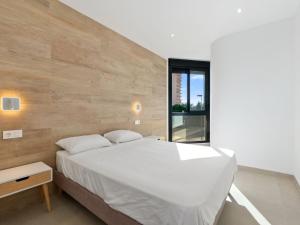 Postel nebo postele na pokoji v ubytování Apartment Tropical Beach Penthouse by Interhome