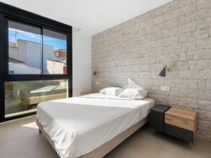 Postel nebo postele na pokoji v ubytování Apartment Tropical Beach Penthouse by Interhome