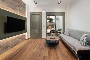 TV a/nebo společenská místnost v ubytování Kimia Luxury Apartments