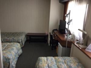 Tempat tidur dalam kamar di Palude Kushiro