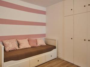 En eller flere senge i et værelse på Apartment Ca' Dolce Osteno by Interhome