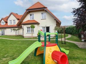Детска площадка в Holiday Home Domek Joanna-5 by Interhome