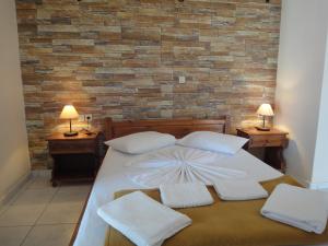 Posteľ alebo postele v izbe v ubytovaní Zambia Apartments