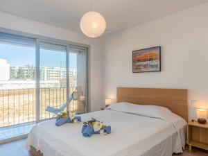 Postel nebo postele na pokoji v ubytování Apartment Montijo by Interhome