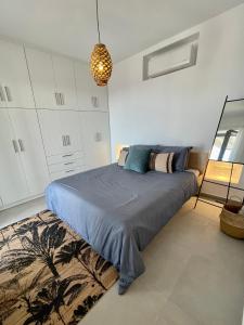 Postel nebo postele na pokoji v ubytování Sunkiss Paros