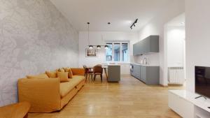 A kitchen or kitchenette at SAHI - Dei dell'Olimpo apartments Porta Romana