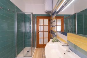 Koupelna v ubytování Casa Teresa + 25 fotografií