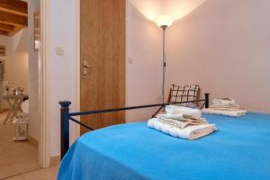 Ein Bett oder Betten in einem Zimmer der Unterkunft Fortezza - Hvar Old Town Apartment