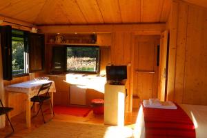 TV a/nebo společenská místnost v ubytování Ecorturismo Casa Espigueiro P Nacional Peneda Geres