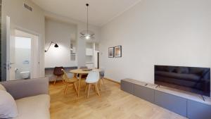 A seating area at SAHI - Dei dell'Olimpo apartments Porta Romana