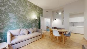 A seating area at SAHI - Dei dell'Olimpo apartments Porta Romana