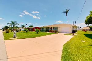 a driveway leading to a house at Southwest Florida Sanctuary in Cape Coral