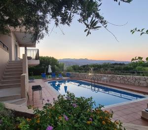 a view of a swimming pool in a villa at VILLA PAGONI Residence Selini Villas N 1 Kolymbari Chania in Kolymvari