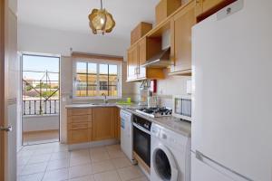 Η κουζίνα ή μικρή κουζίνα στο Algarve apartments H