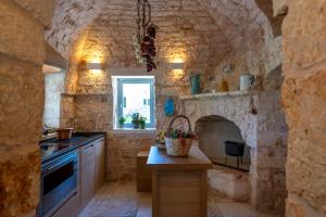 Kuchyňa alebo kuchynka v ubytovaní Ostuni Art Resort
