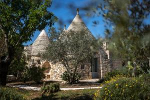 Vonkajšia záhrada v ubytovaní Ostuni Art Resort