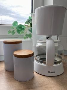 a food processor sitting on top of a counter at ZEN studio in the heart of Bucharest in Bucharest
