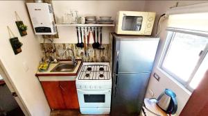 Kjøkken eller kjøkkenkrok på Lircaydomohostal - Domo 40m2 para 4 personas