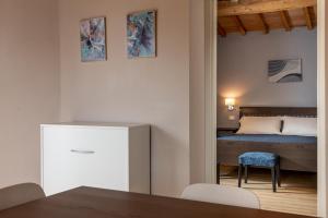 Postel nebo postele na pokoji v ubytování Podere n.8 Bio Casale Maremma