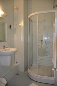 a bathroom with a shower and a sink at Vila Julia Costinesti in Costinesti +141 photos