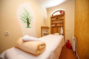 Postel nebo postele na pokoji v ubytování Wellness Pension 7