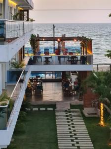 a view of the ocean from the balcony of a hotel at Camino Palmero Coveñas in Coveñas