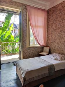 Letto o letti in una camera di Friendly Guest House