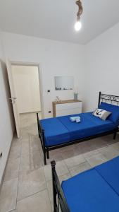 Postel nebo postele na pokoji v ubytování Appartamenti Mirante