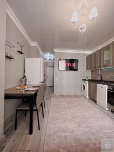 Kuchyň nebo kuchyňský kout v ubytování RentHouse Apartments Premium Living