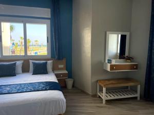 Voodi või voodid majutusasutuse HOSTAL MH BORJ toas