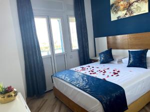Voodi või voodid majutusasutuse HOSTAL MH BORJ toas