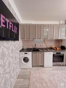 Kuchyň nebo kuchyňský kout v ubytování RentHouse Apartments Premium Living