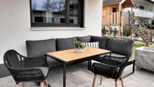 Posezení v ubytování MK Appartements + 6 fotografií