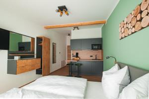 Postel nebo postele na pokoji v ubytování MK Appartements