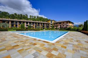 Πισίνα στο ή κοντά στο La Torretta by Garda FeWo