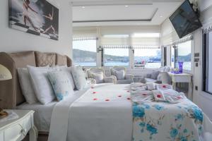 Postel nebo postele na pokoji v ubytování Dantela Butik Hotel
