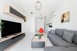 TV a/nebo společenská místnost v ubytování Apartamento Los Alcores