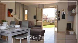 Posezení v ubytování Residence La Perla