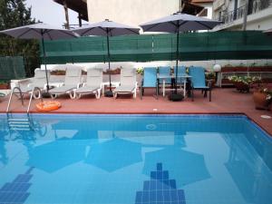 Bazén v ubytovaní Villa in Panorama, Thessaloniki, with a swimming pool. Host: Mr. George alebo v jeho blízkosti