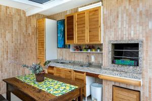 ภาพในคลังภาพของ Duplex vista para o mar na praia dos Açores ในฟลอเรียนอโปลิส