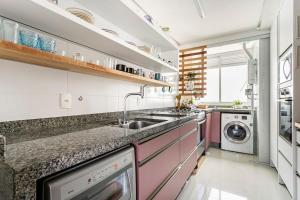 ภาพในคลังภาพของ Duplex vista para o mar na praia dos Açores ในฟลอเรียนอโปลิส