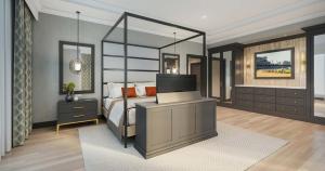ルイスビルにあるDerby City Gaming & Hotel - A Churchill Downs Propertyのベッドルーム(大型ベッド1台、大きな鏡付)