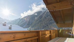 a balcony with a view of a mountain at Haus Gleinser - Neustift im Stubaital in Neustift im Stubaital