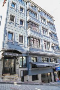 a blue building with a store in front of it at Asitane Life Hotel in Istanbul