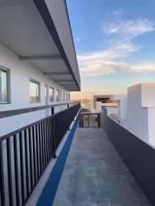 a view from the balcony of a building at Vêneto Flat Residence (AP-13) in Primavera do Leste