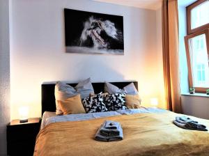 Postel nebo postele na pokoji v ubytování Modernes Apartment mit Balkon