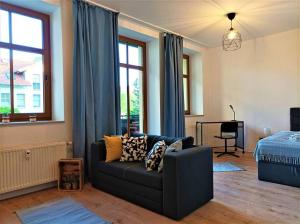 Posezení v ubytování Modernes Apartment mit Balkon