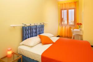 เตียงในห้องที่ B&B Sorrento Sunshine