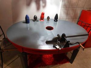 a table with many different items on top of it at Budapest BDSM Studio in Budapest
